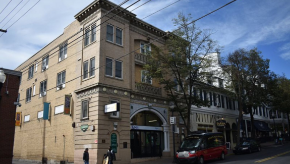 Exterior of tan brick building