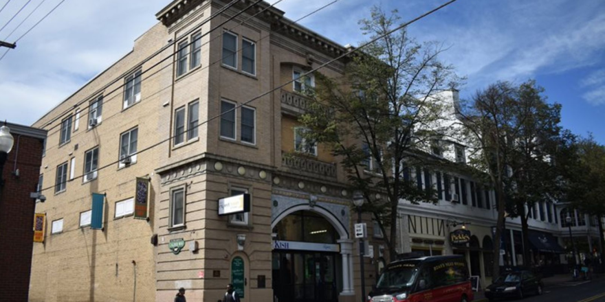 Exterior of tan brick building