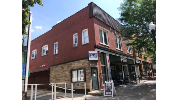 Exterior of apartment building 230 E College Ave