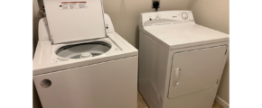a washer and dryer in a small room