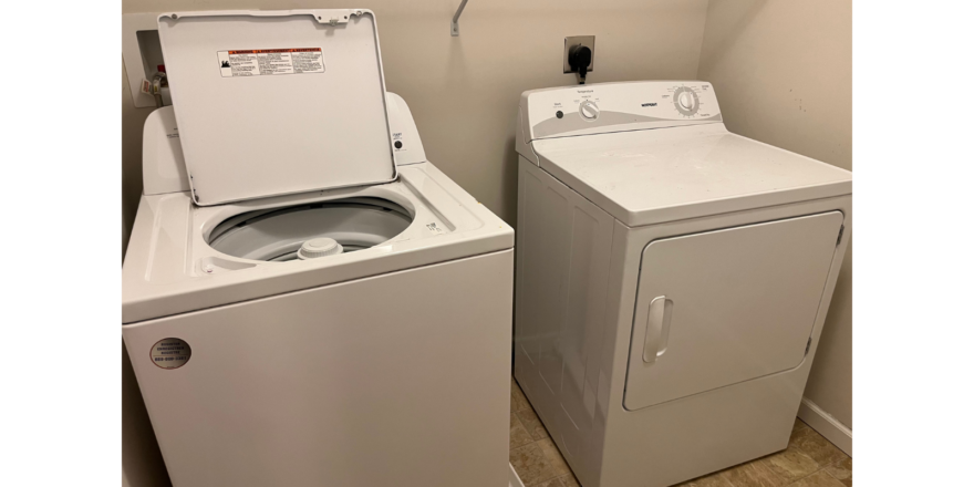 a washer and dryer in a small room