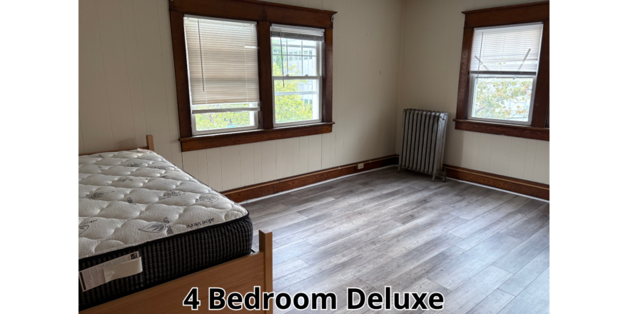 a bedroom with a bed and a radiator in it