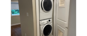 a washer and dryer in a small room