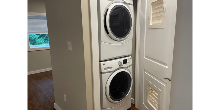 a washer and dryer in a small room