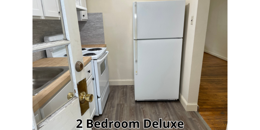 a white refrigerator freezer sitting inside of a kitchen