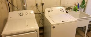 Laundry room with washer, dryer, and laundry tub