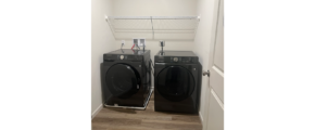 a washer and dryer in a small room