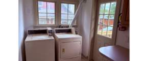 a washer and dryer in a small room