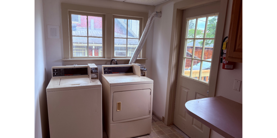 a washer and dryer in a small room