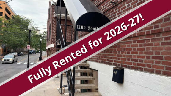 a red and white sign that says fully restored for 205 - 2077