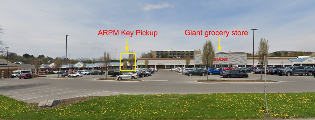 a parking lot with cars parked in it