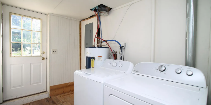 a washer and dryer in a small room